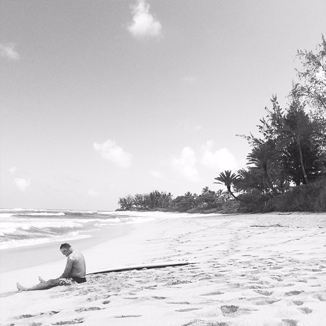 Surfer resting in Kailua